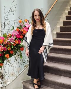 Flavia Standing on the stairs at Tiffany's on Bloor and DJing Dinner at for CANFAR AIDS and HIV research in Toronto